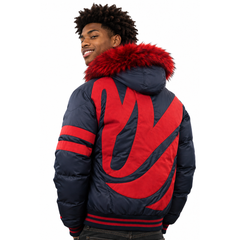 A man wearing a navy blue puffer jacket with a large red graphic on the back, red stripes on the sleeves, and a bright red faux-fur hood trim, shown from the back against a white background.